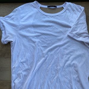 White workout top with cutout back